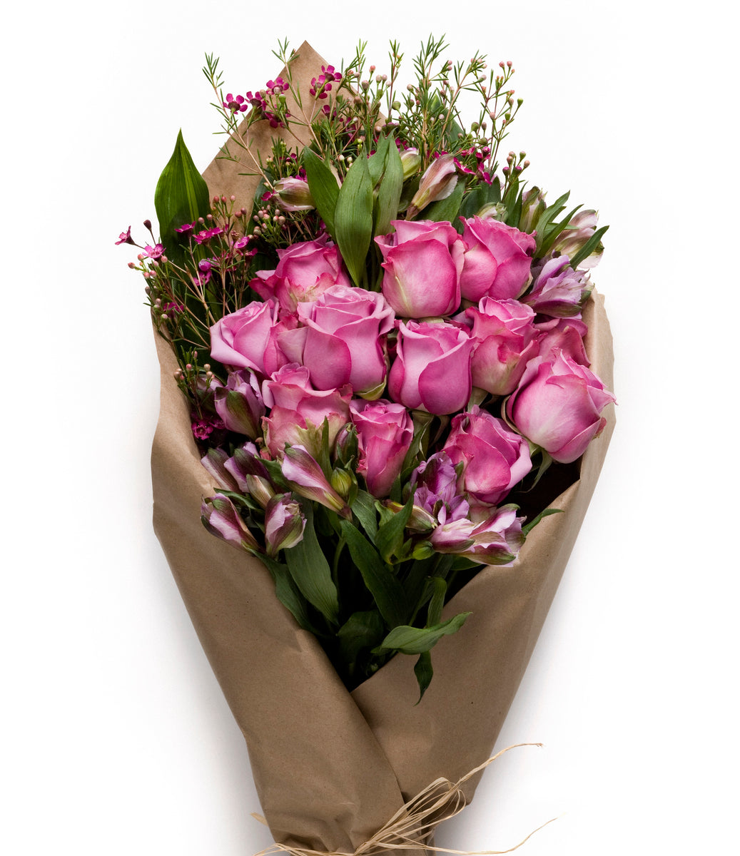 Beautiful Bouquet in Pink Wrapping Paper. Roses and Other Delicate  Beautiful Flowers Stock Photo - Image of bloom, decoration: 142162412